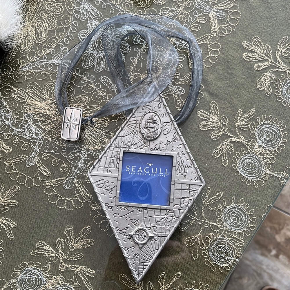 Nova Scotia Seagull Pewter hanging picture frame. New condition